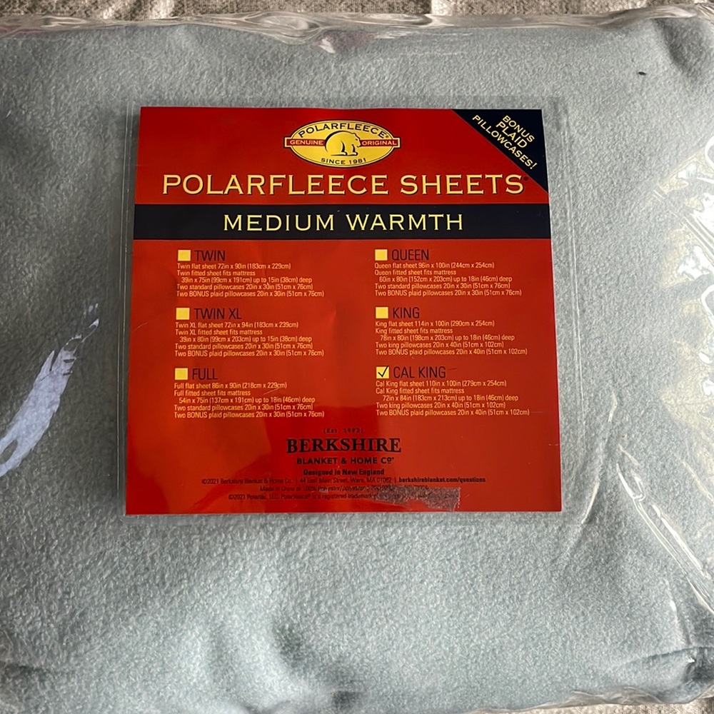 Polar fleece medium warmth sheets! Cal King light blue with plaid pillowcases.